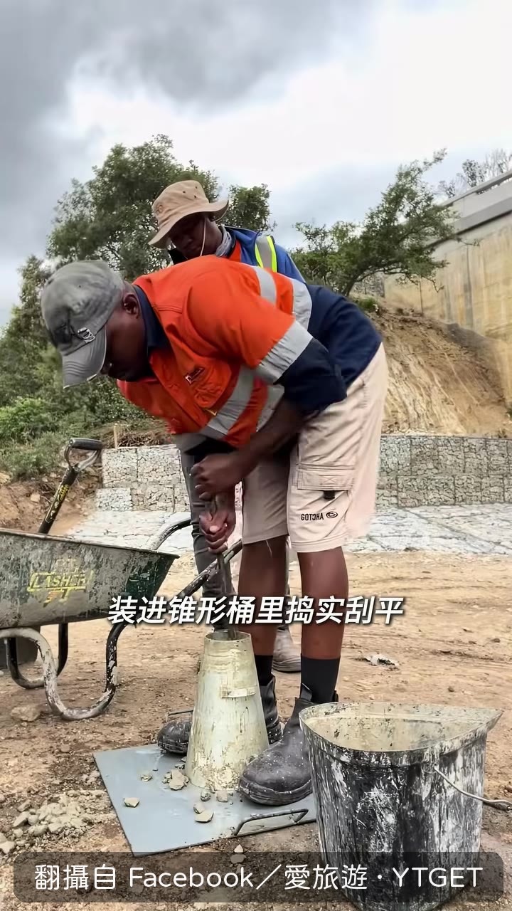 垂直提起鐵桶測坍落度
