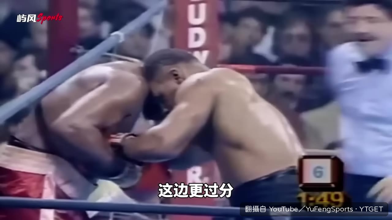弗格森夾住泰森拳套