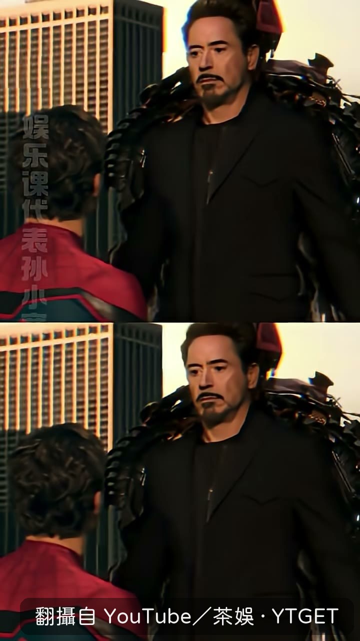 東尼穿著西裝從戰甲裡走出來